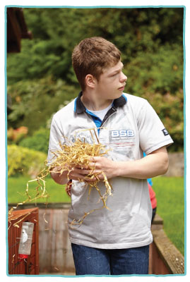 Young person enjoying an outdoor setting.